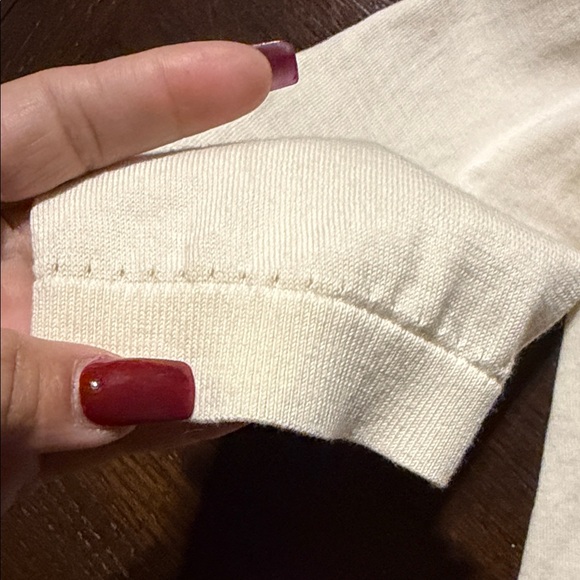 Kate Spade Ruthie Bow Cardigan in cream with black bows. - Picture 4 of 8